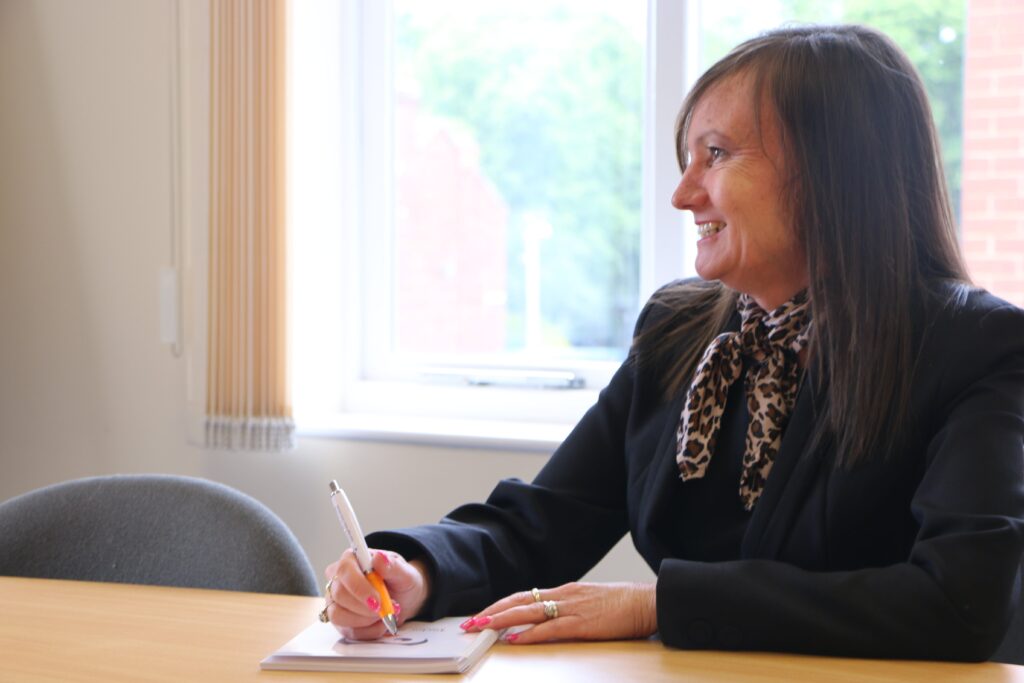 Dawn Hughes with a client